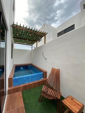 Bonita casa con jacuzzi, frente al área común